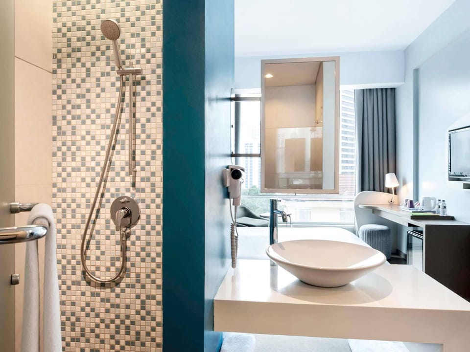 Shower, rainfall showerhead, eco-friendly toiletries, hair dryer