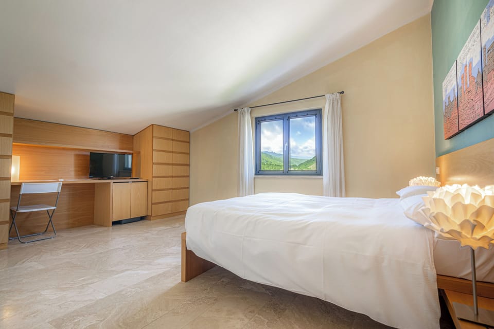 Family Room | 1 bedroom, minibar, in-room safe, desk