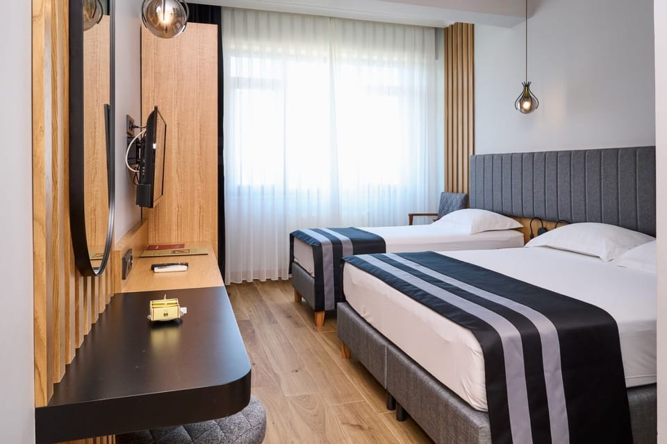 Triple Room | Minibar, in-room safe, soundproofing, free WiFi