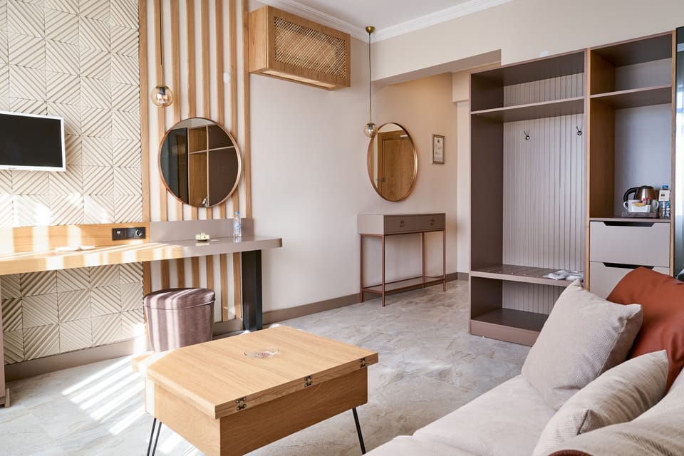 Suite, Sea View | Living area | LCD TV