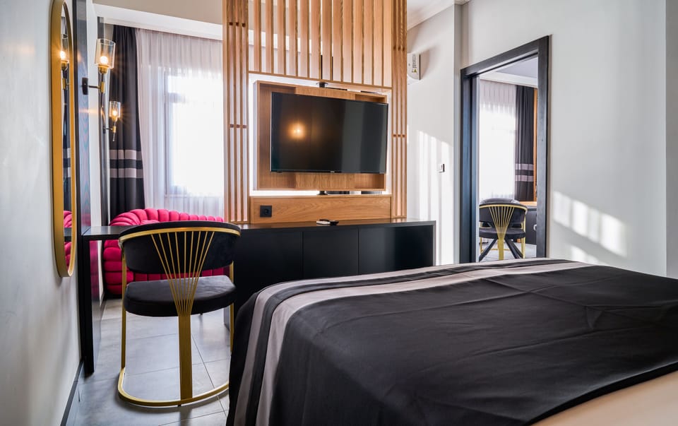 Suite, Sea View | Minibar, in-room safe, soundproofing, free WiFi