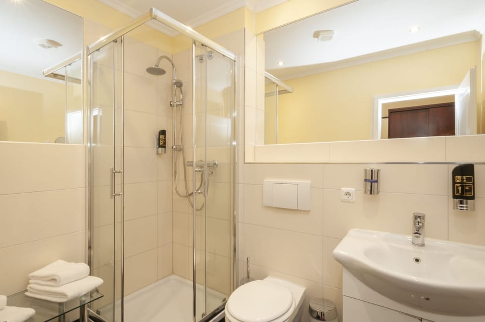 Shower, free toiletries, hair dryer, towels