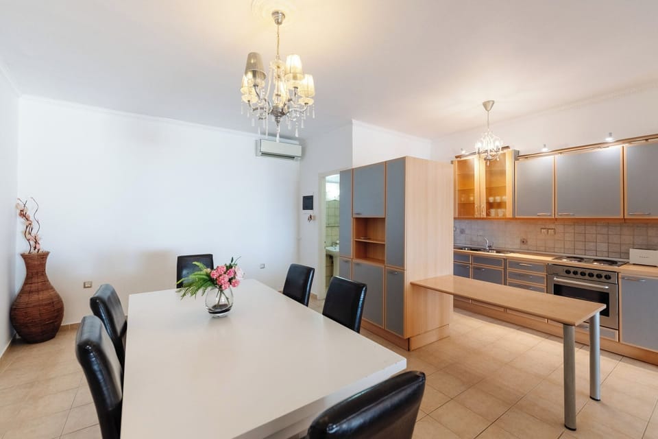 Superior Suite with private terrace and Pontikonisi island view | Minibar, in-room safe, blackout drapes, soundproofing