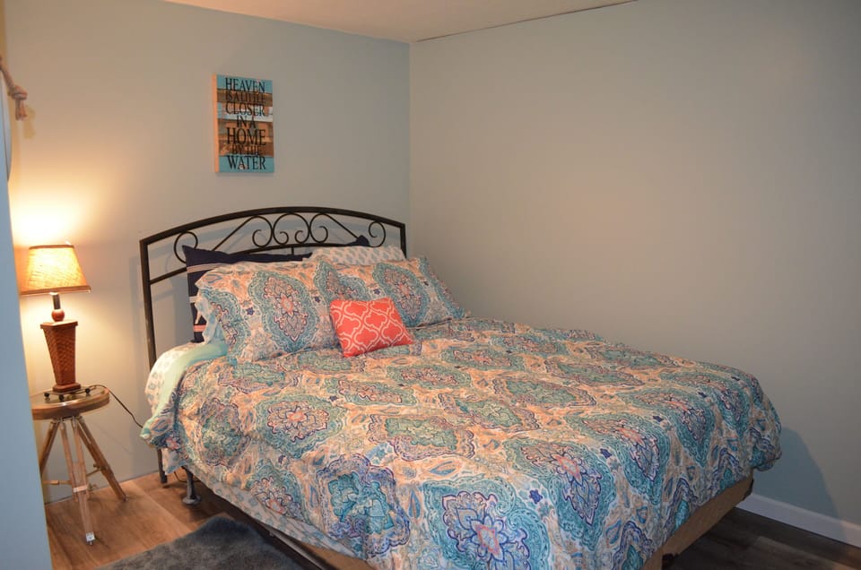First floor bedroom 1 contains a queen bed 
