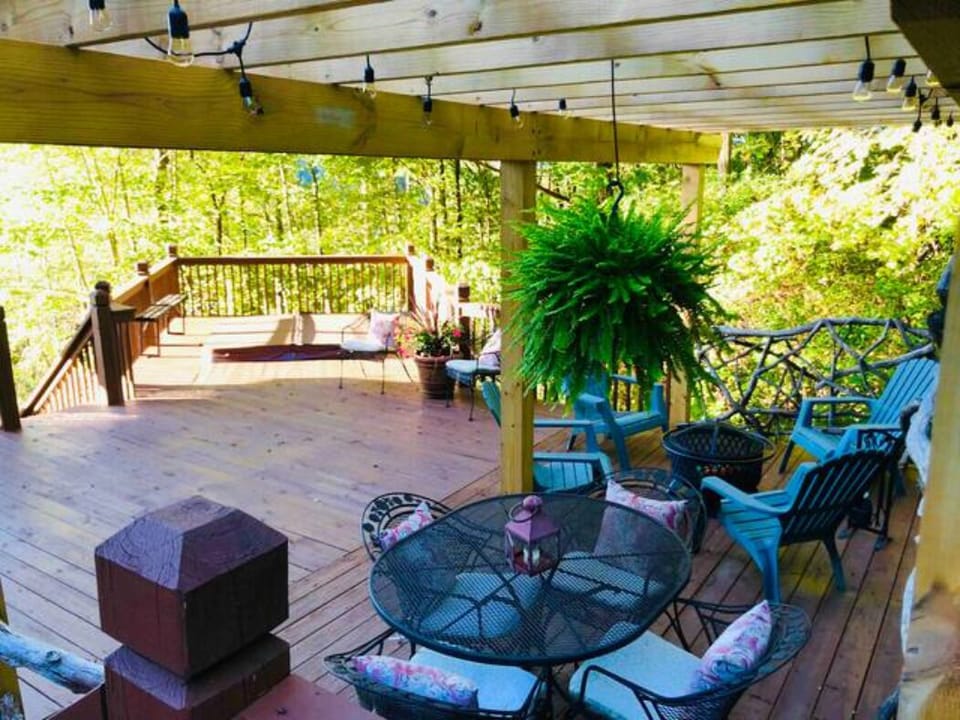 Lovely large outdoor living space with hot tub and fire pit
