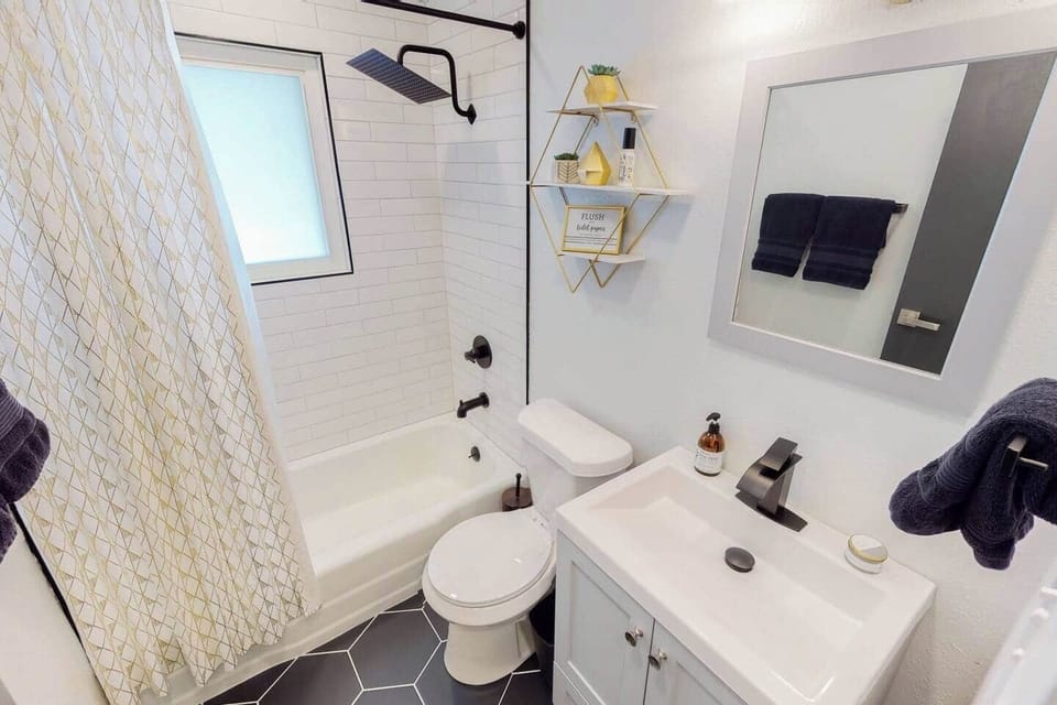 Upstairs Bathroom, Fully Remodeled with tiled tub/shower with rain fall shower head