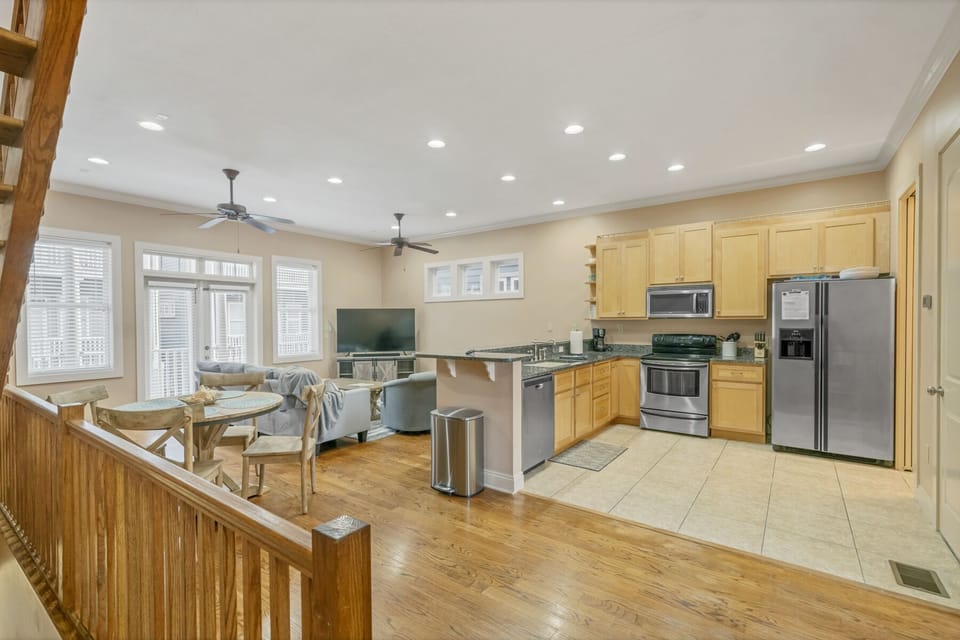 Large kitchen, dining, living room perfect for gathering. 65" 4K TV!