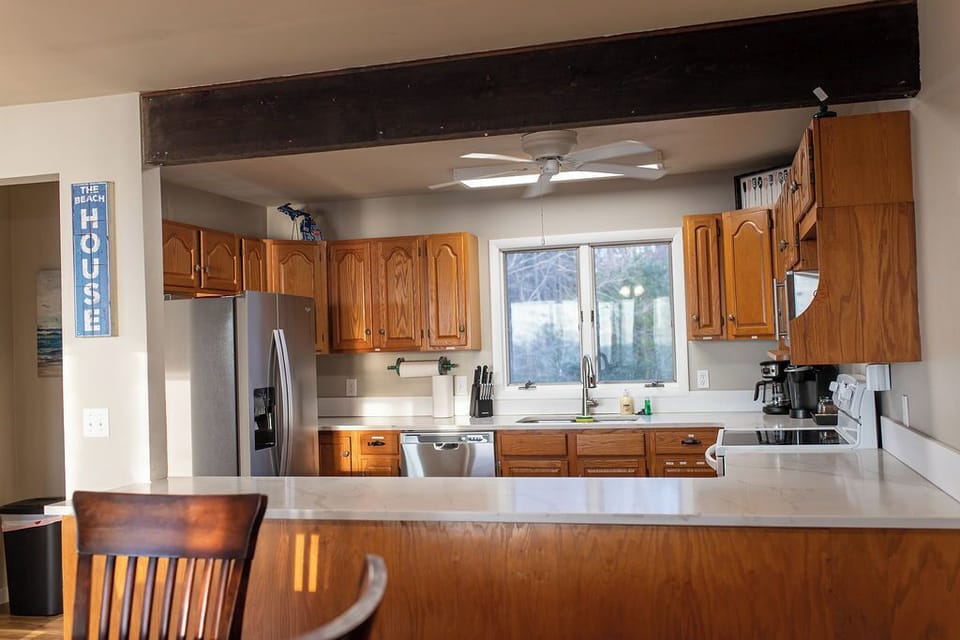 Main floor kitchen with spacious layout perfect for cooking and gathering