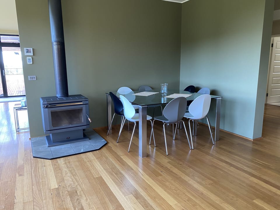 8 seat dining table near the fire place