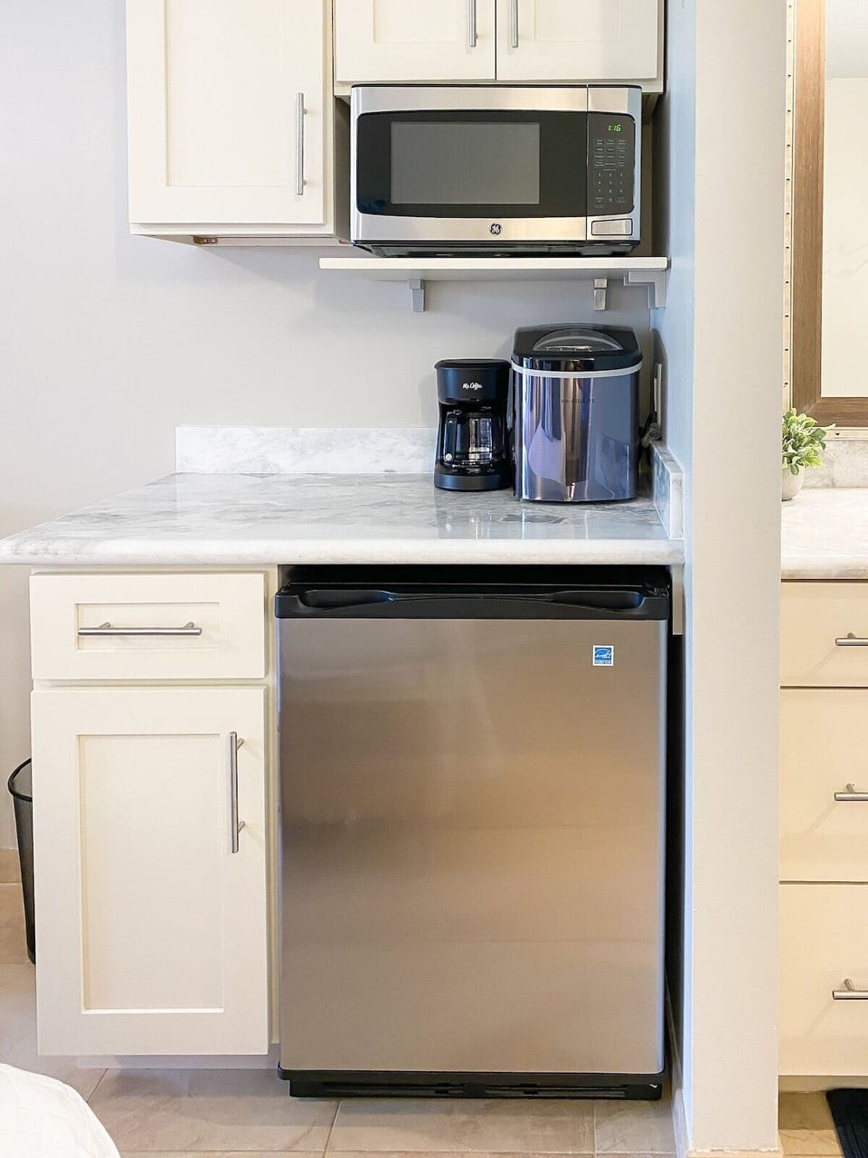 Kitchenette offers a microwave, coffee pot and small refrigerator.