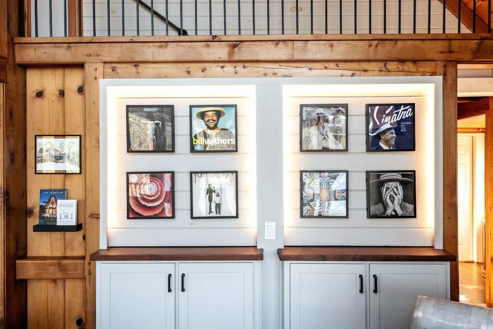 A few of our favorite artists are featured on the vinyl art wall