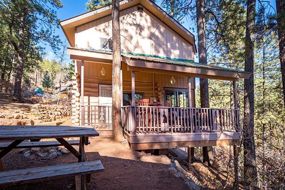 Nestled in the trees, dine outside under the deck, or on the picnic table. BBQ.