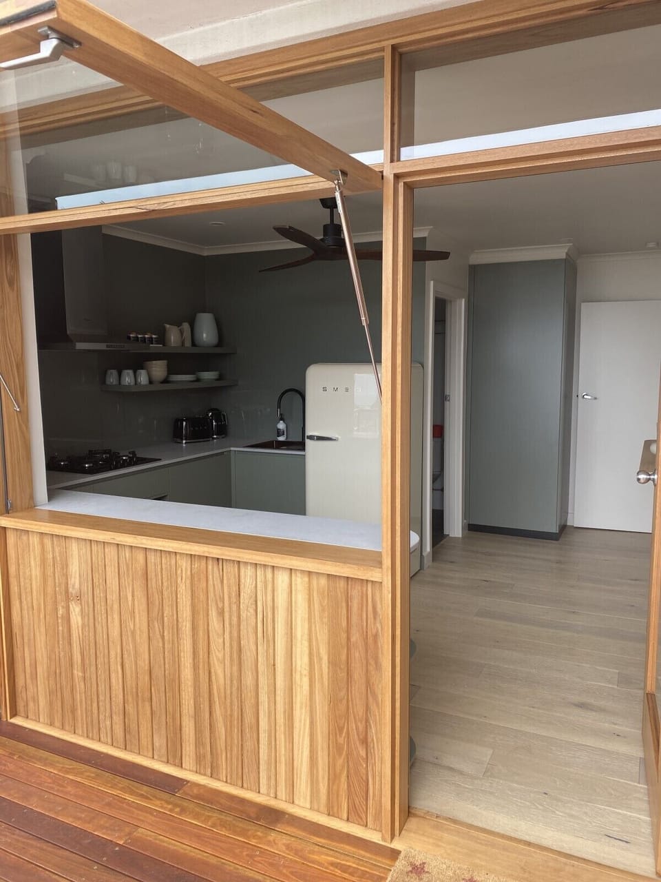 The Crest Apartment | Private kitchen | Mini-fridge, microwave, oven, stovetop