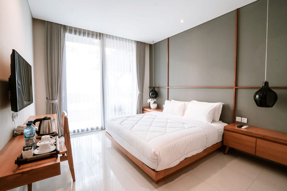 Deluxe Double Room, Pool View | Blackout drapes, soundproofing, free WiFi, bed sheets
