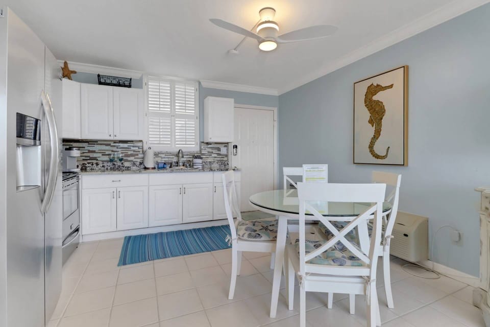 Enjoy dining in the open kitchen space, or invite friend over for a game of cards at the table for 4.