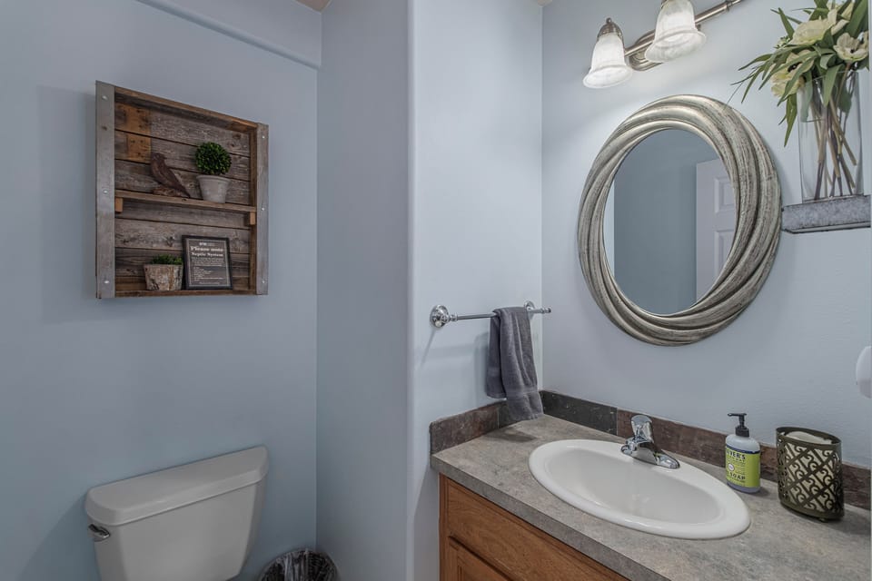 Main Floor Powder Room off of the Kitchen