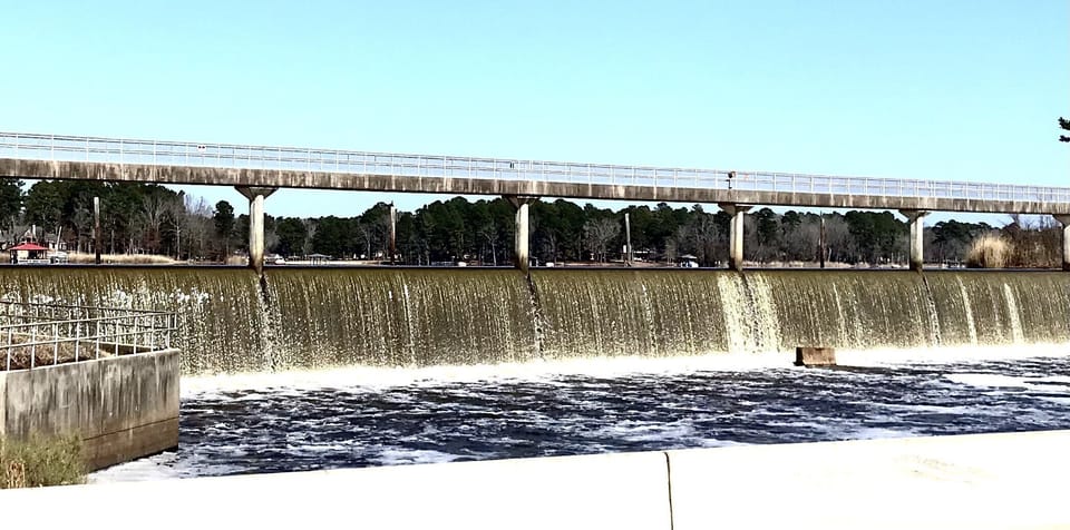 Take the first left after the spillway 