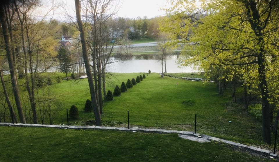 Back yard, riverview. Access to water. Kayaks and canoe available for use.