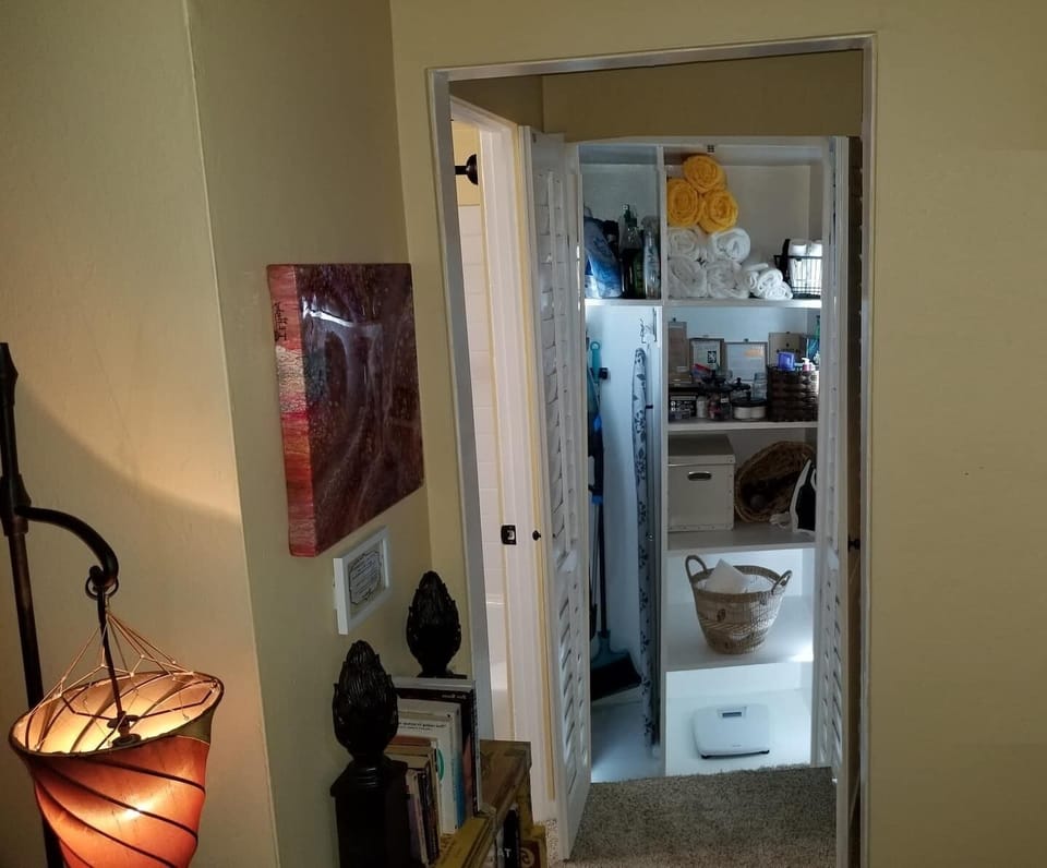 Motion sensor accent lighting in linen cabinet and under kitchen sink counters