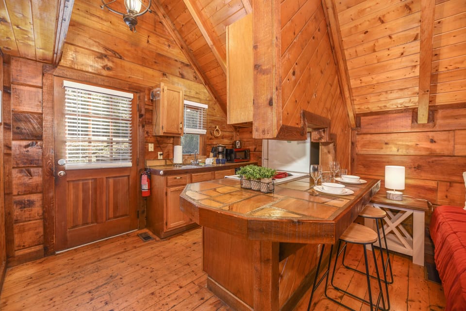 Galley style kitchen next to front entryway