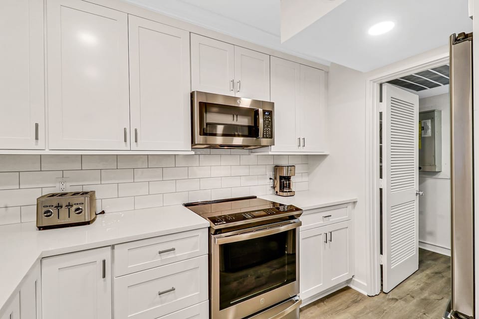 Kitchen - All new stainless appliances, regular drip coffeemaker and plenty of counter space.