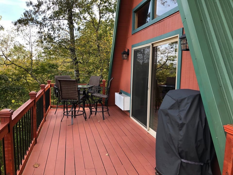 Deck patio table and chairs propane cooking grill
