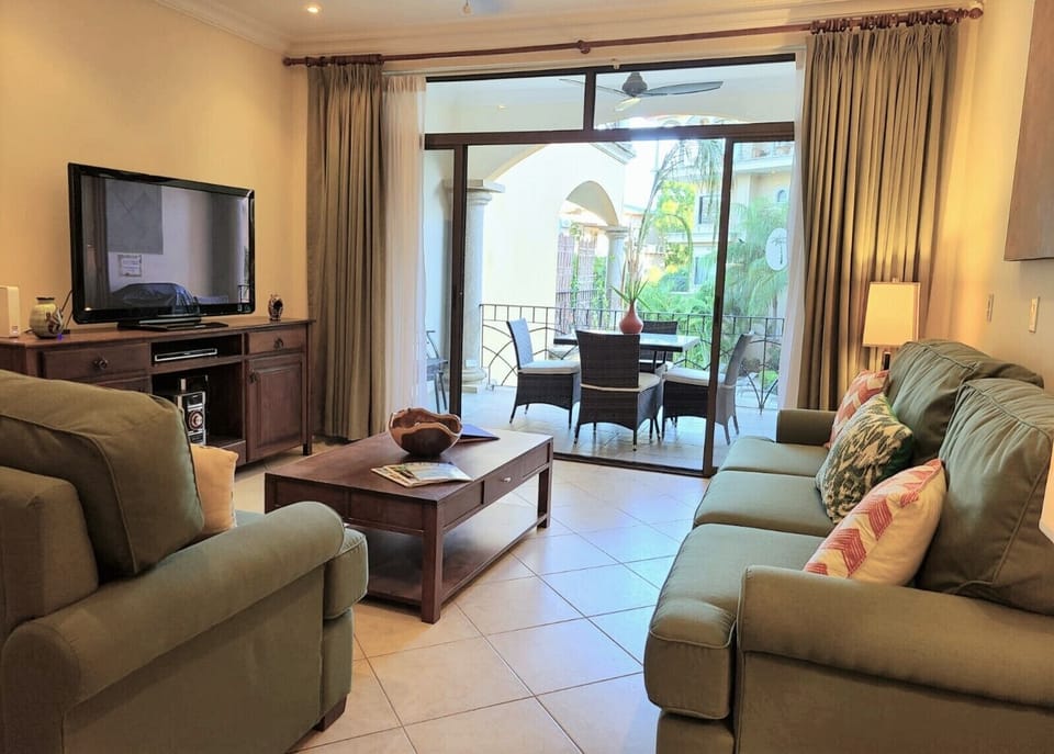 Spacious living room that opens to private balcony 