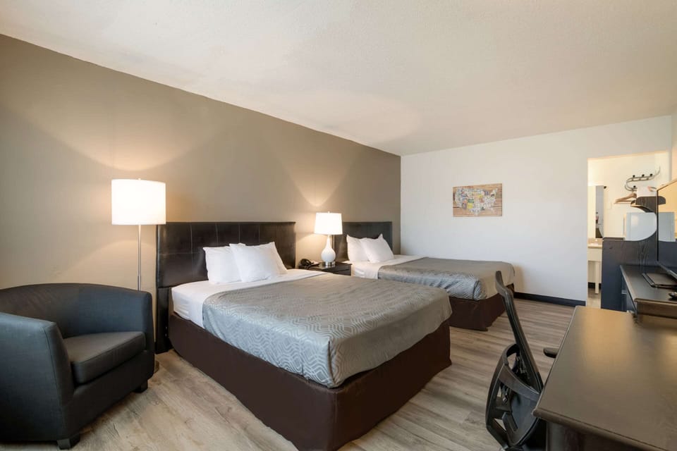 Standard Room, 2 Queen Beds, Non Smoking | Desk, laptop workspace, iron/ironing board, free WiFi