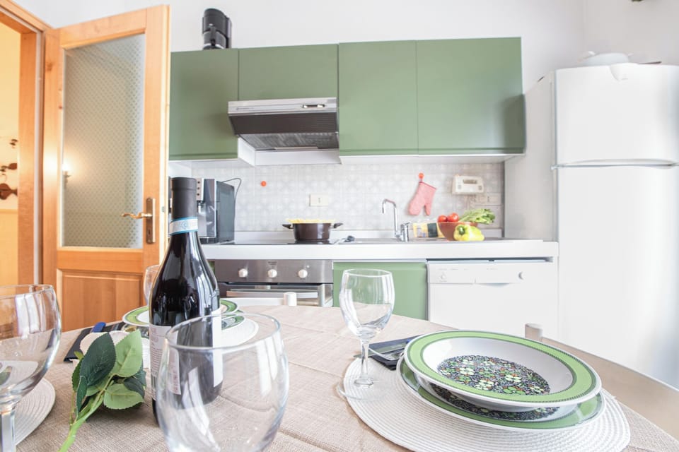 Family Apartment, 2 Bedrooms, Balcony, Mountainside (Paradiso Al Mare Terrace and Shared) | Private kitchen | Coffee/tea maker, dining table