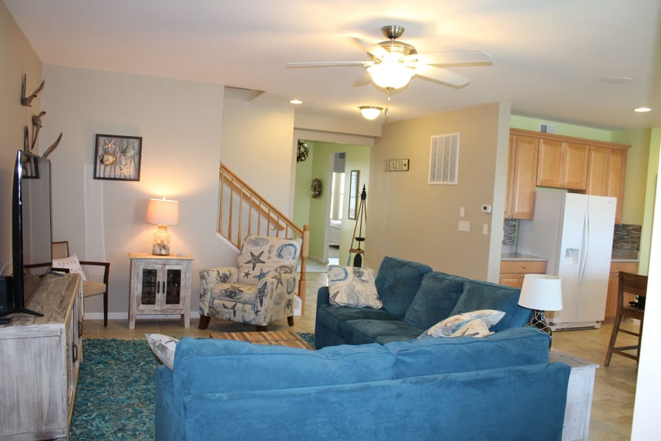 Open living space with kitchen, dining and living room