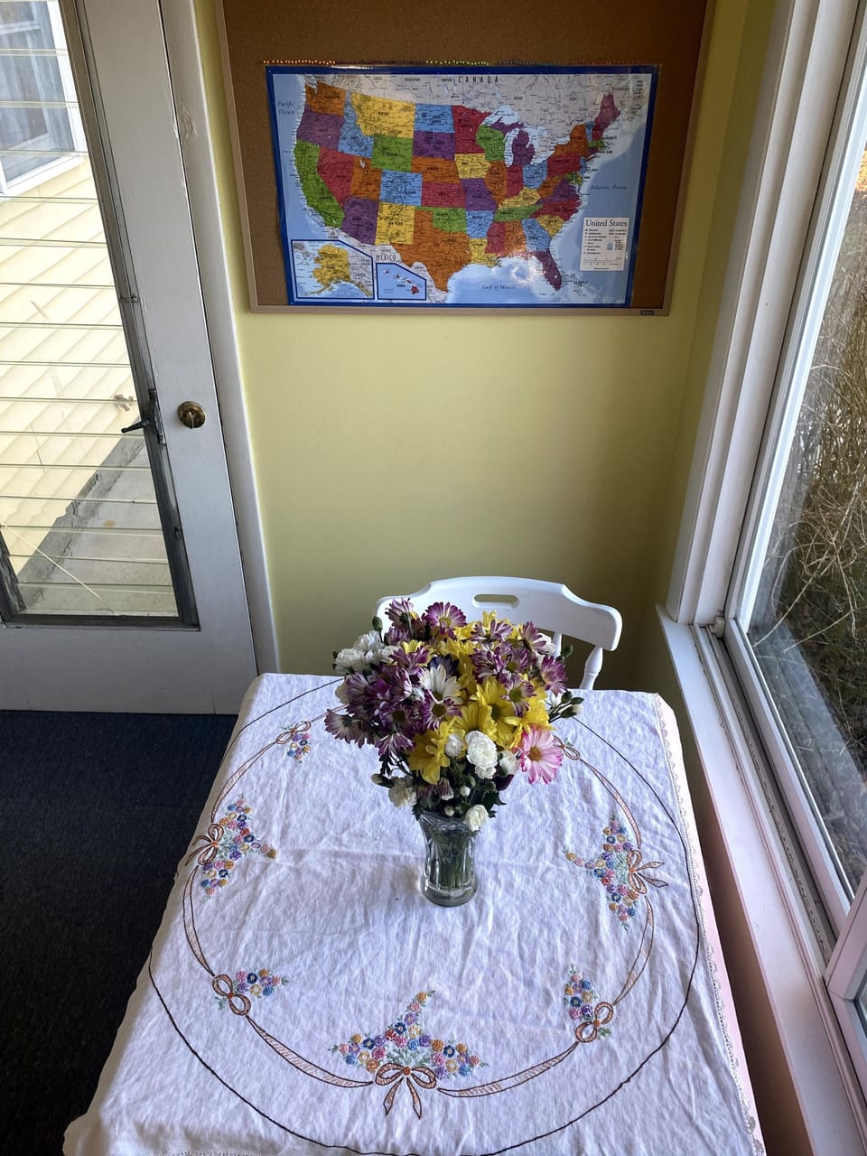 smaller game table in the sunroom