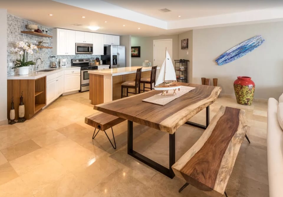 Open kitchen, island with seating and dining area