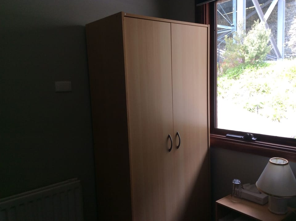 Basic Single Room, Shared Bathroom | Blackout drapes, free WiFi, bed sheets
