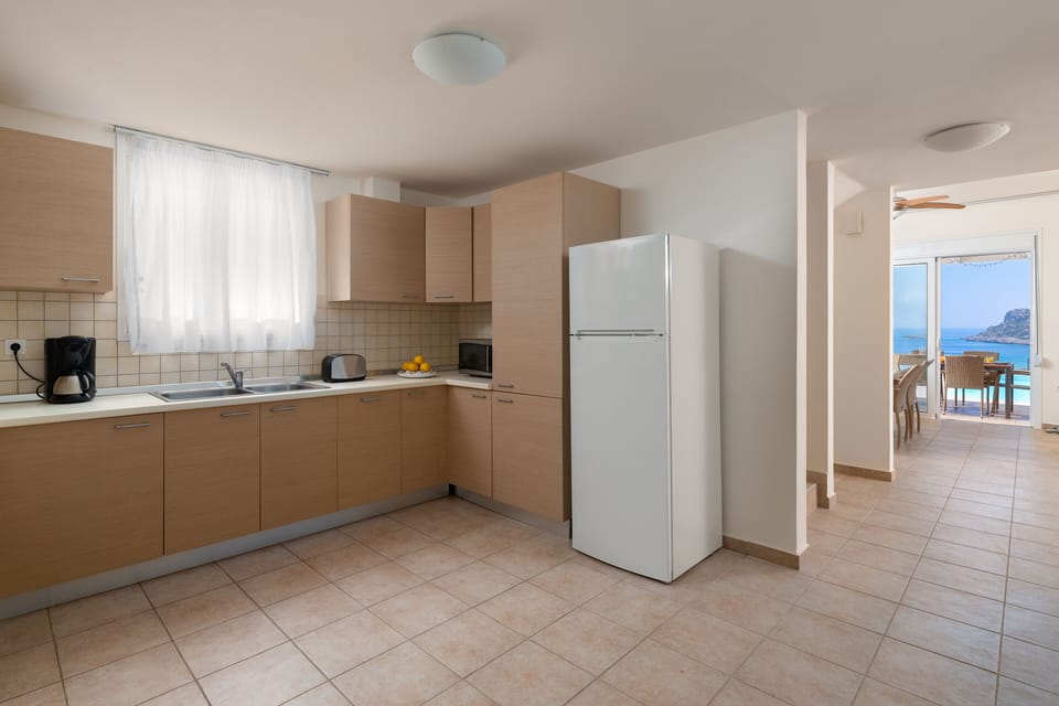 Villa Aegean Blue View Kitchen and view to pool