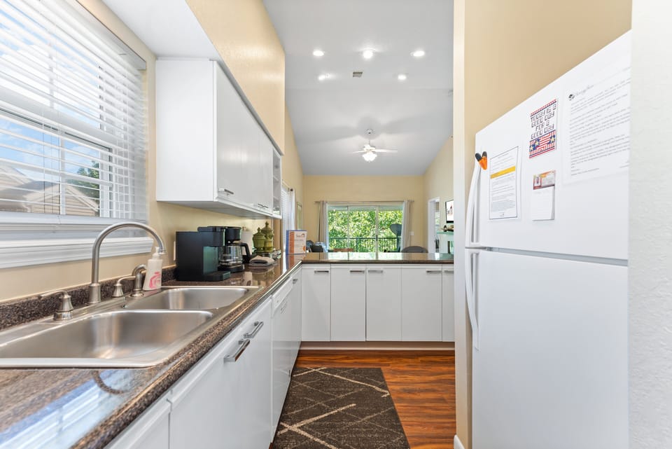 Condo, 2 Bedrooms | Private kitchen | Fridge, microwave, oven, dishwasher