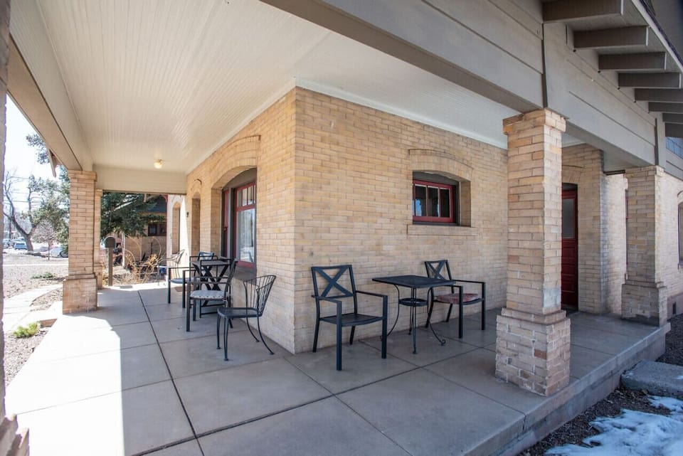 The wrap-around porch is a great place to sit to have coffee, lunch, or happy hour.