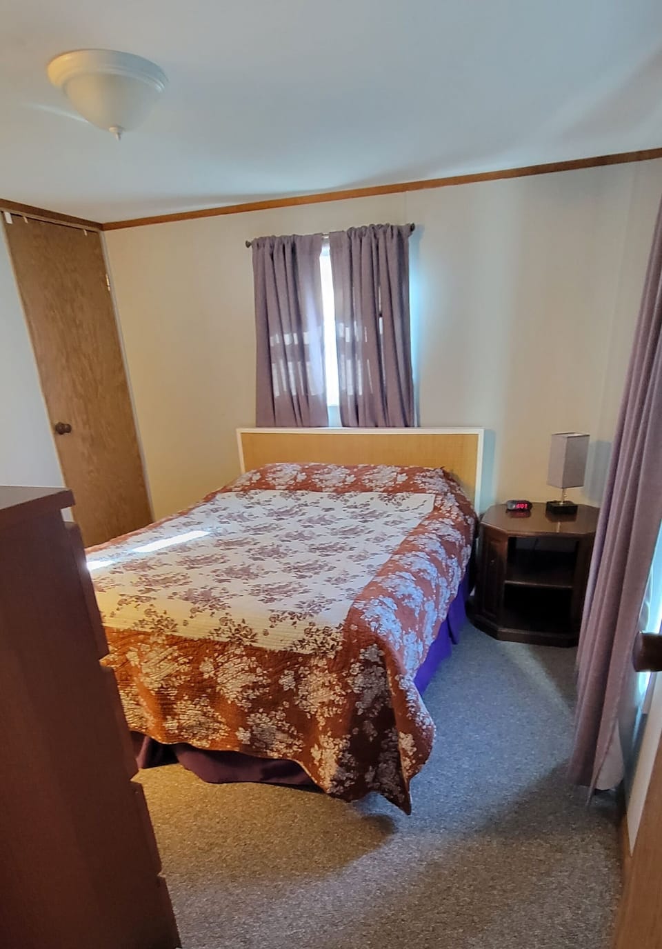 Another view of master bedroom - queen bed and TV