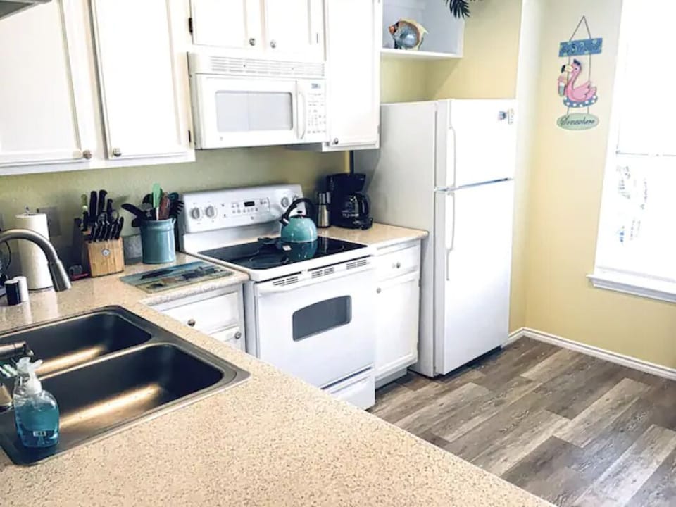 Chef's delight of a kitchen ~ equipped-to-the-hilt plus view of the pool!