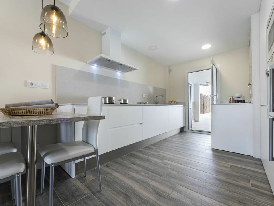 Wood, Floor, Room, Property, Interior Design, Flooring, Ceiling, Light Fixture, Wall, Wood Flooring