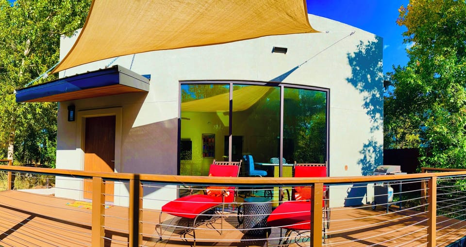 Front of home. Huge deck on the river. Private, relaxing and modern. 