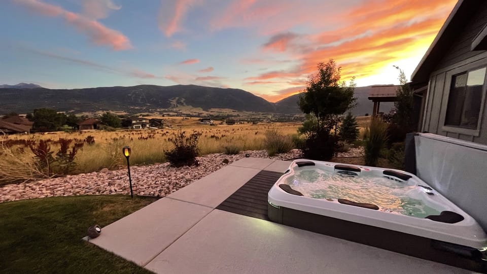 Relax and enjoy the stunning views from the private hot tub!