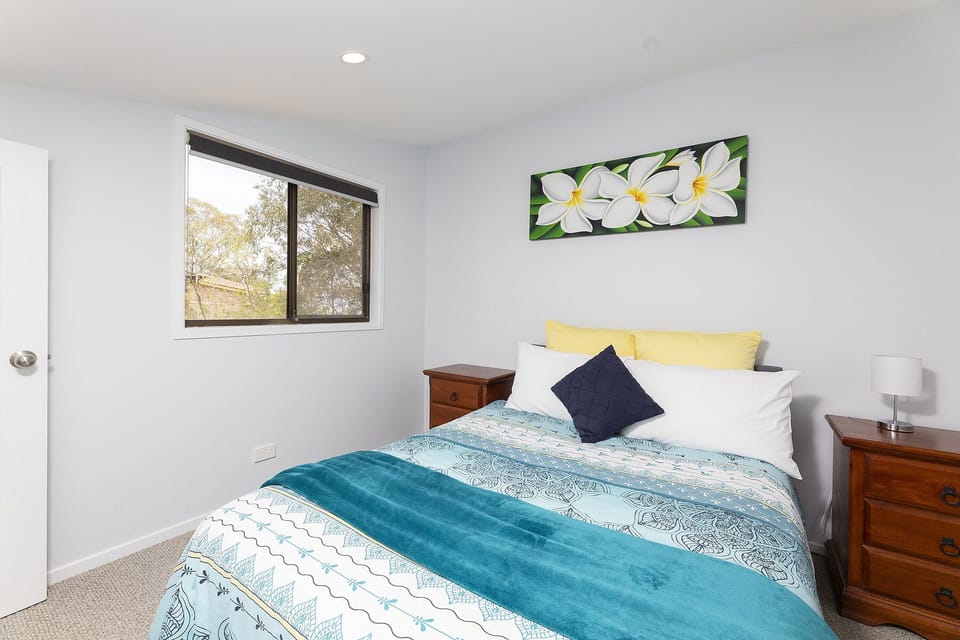 Bedroom four with queen bed, upper level