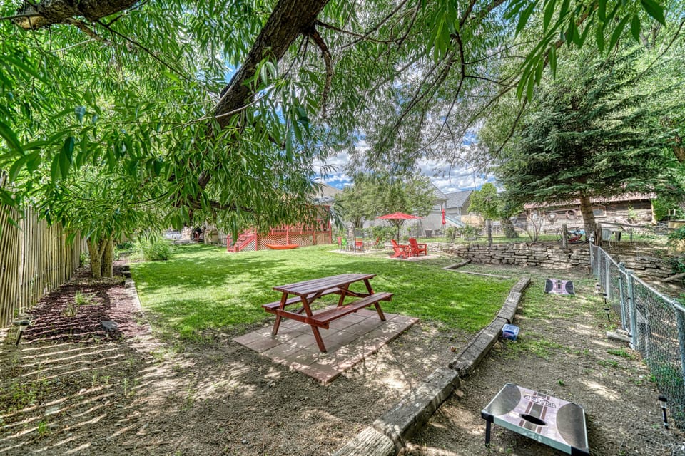 Enjoy this spacious backyard with family, friends, and fur babies!