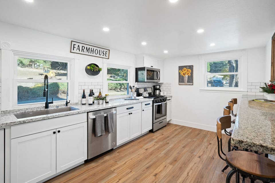 Kitchen - Entering the Spacious and Modern Kitchen with Stainless Steel Appliances