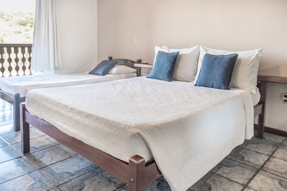 Standard Quadruple Room | Premium bedding, minibar, blackout drapes, free WiFi