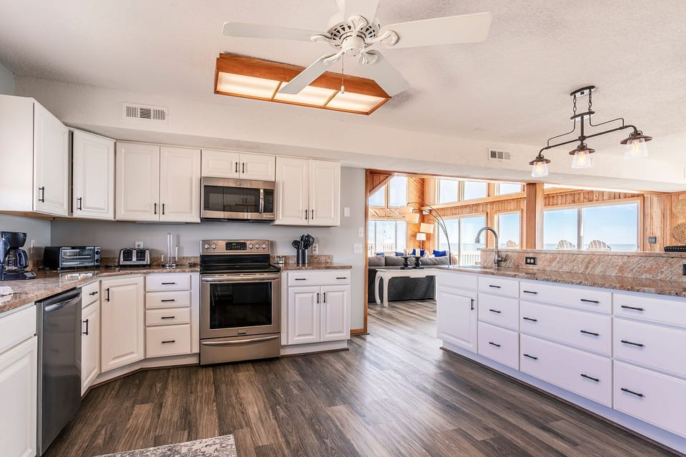 Electric range, oven, built in microwave, & dishwasher to feed your entire group