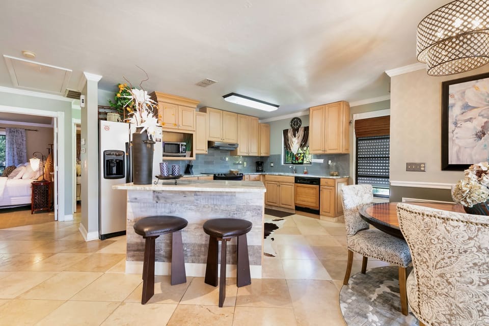 Suite, 2 Bedrooms | Private kitchen | Full-size fridge, microwave, stovetop, dishwasher