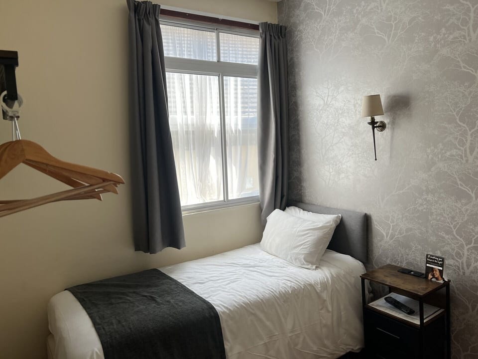Single Room | Desk, iron/ironing board, WiFi (free), bed sheets