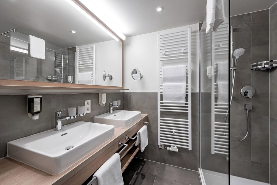 Family Room, 2 Bedrooms, Balcony, Mountain View (Hochwilde) | Bathroom | Deep soaking tub, hair dryer, bathrobes, slippers