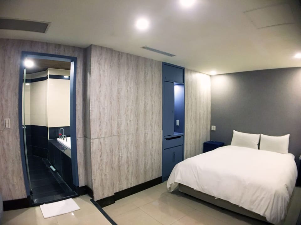 Standard Room, No Windows | Down comforters, minibar, individually decorated, individually furnished